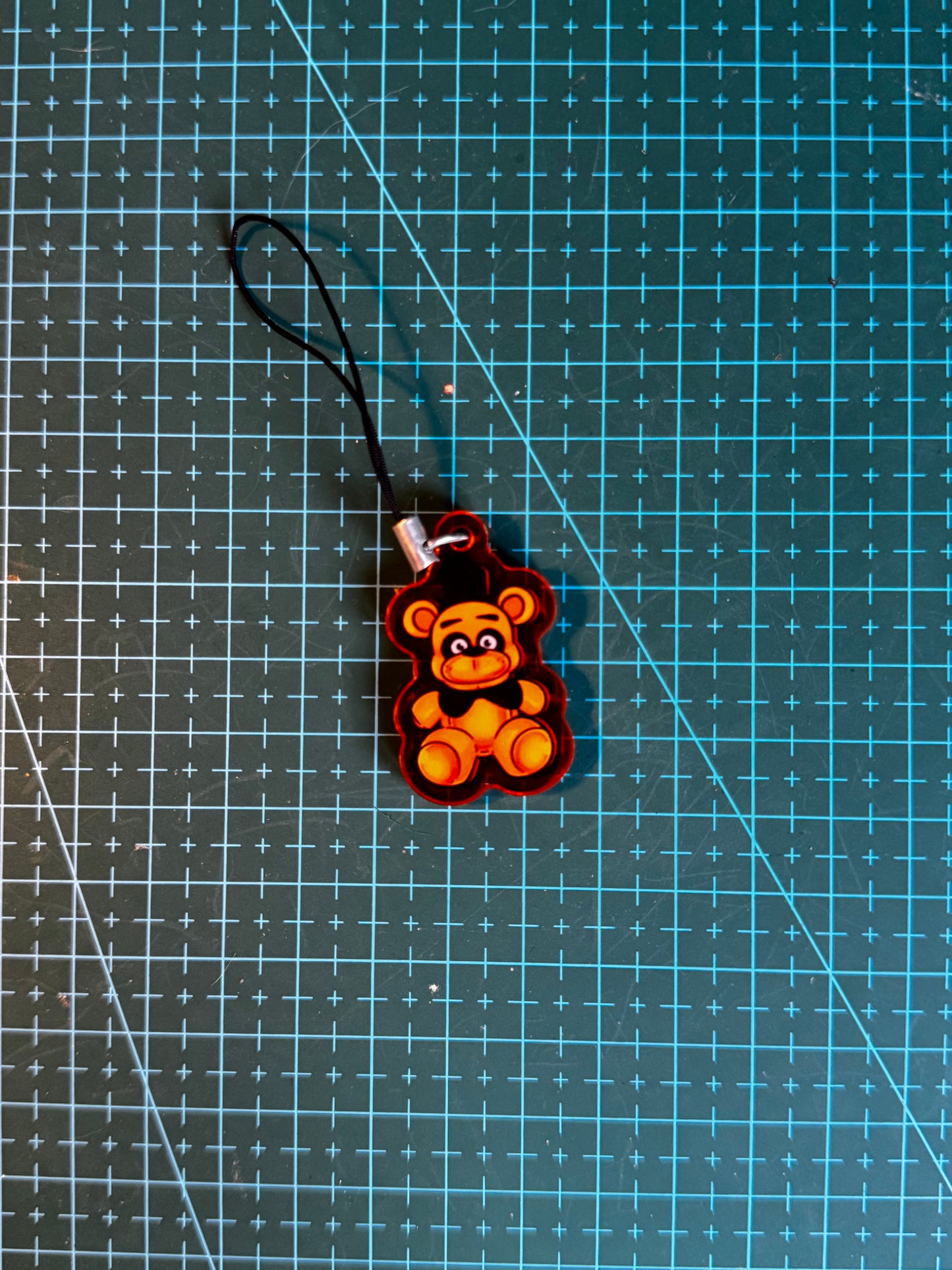 Golden freddy charm
